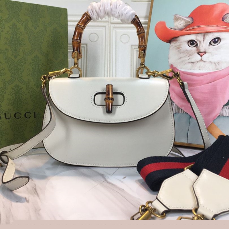G*u*i top handle bags